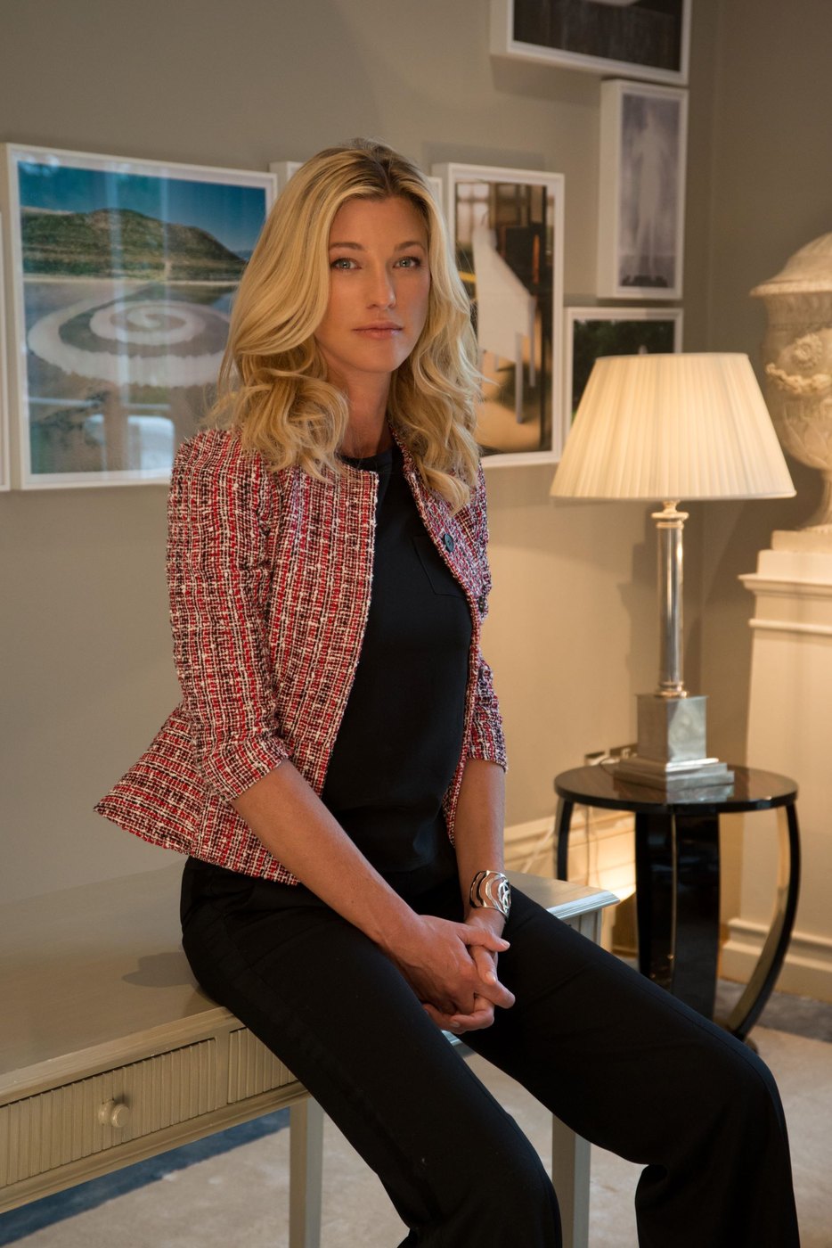 Nicole Junkermann seated in a tweed jacket in a calm room, looking towards the camera Nicole Junkermann seated in a tweed jacket in a calm room, looking towards the camera